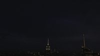 Vista para o telhado do Empire State Building na noite 4K