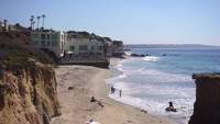 A beautiful house sits cliffside on the Malibu Beach Coast 4K