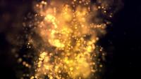 Golden soft particles floating like a cloud in the center of the scene