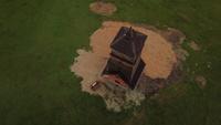 Drone orbiting a watchtower 4K