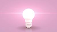 Jumpin white bulb towards camera and lighting against purple pastell background