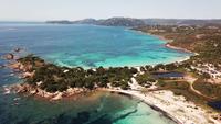 Flying over a cliff and beach in 4K