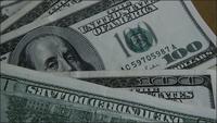 Roterande stock footage skott på $ 100 räkningar - MONEY 0154