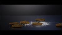 Galletas que caen desde arriba sobre una superficie reflectante - COOKIES 188