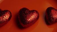 Rotating stock footage shot of Valentines decorations and candies - VALENTINES 0031