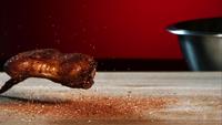 BBQ thrown and bouncing in ultra slow motion (1,500 fps) with flavorful spices - BBQ PHANTOM 041
