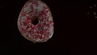 Donas cayendo y rebotando en cámara ultra lenta (1,500 fps) sobre una superficie reflectante - DONUTS PHANTOM 051