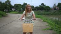 Woman riding a bike in the park