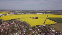 Drone descending to the village in 4K