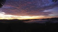 Sunrise over mountains and fog