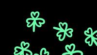 Tumbling Shamrocks Against Transparent Background