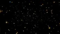 Goldsterne und Schneestaub fallen und verblassen