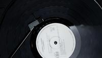 Vinyl disc on old turntable top view
